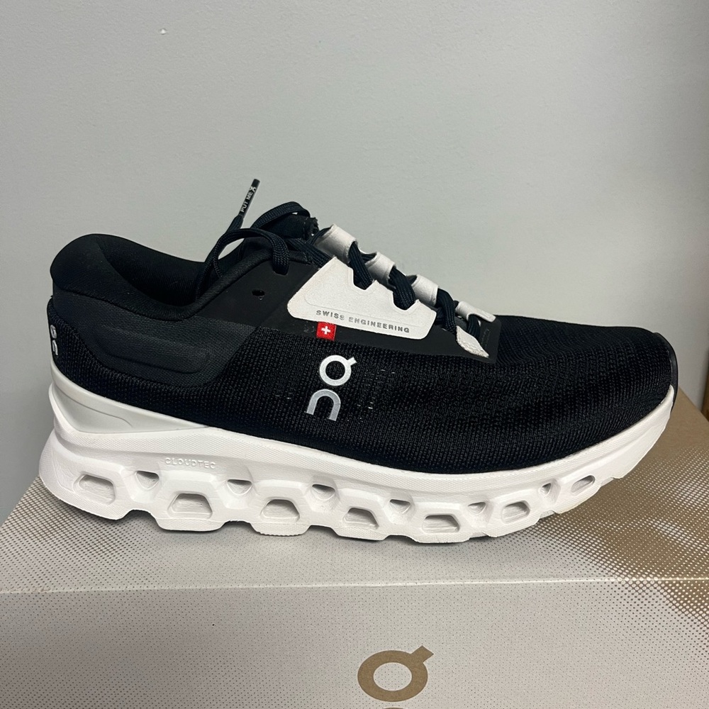 On Running women's Black and White Shoes.